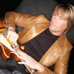 Rockie Lynne Talks The Art Of Songwriting & Bartending For Charity